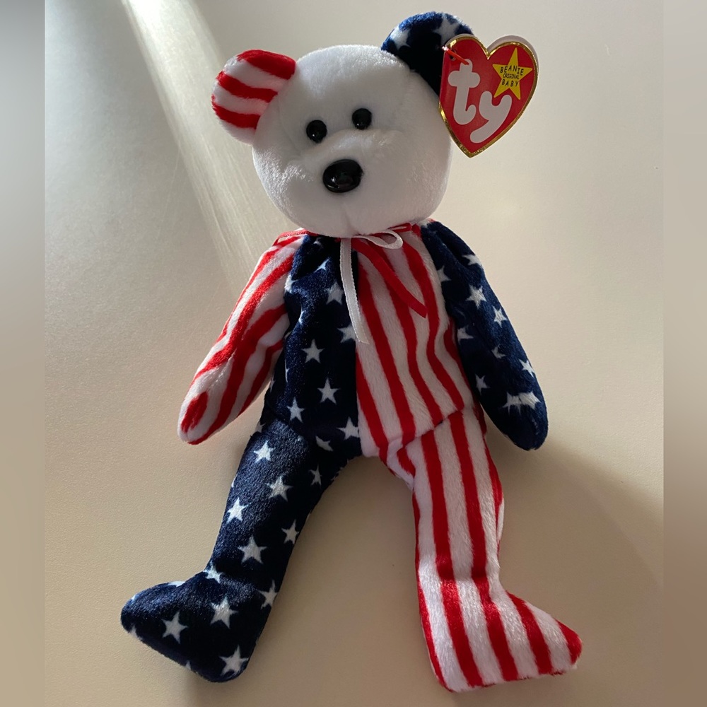 NWT BEANIE BABY - “Spangle” the bear, kept in collectible case